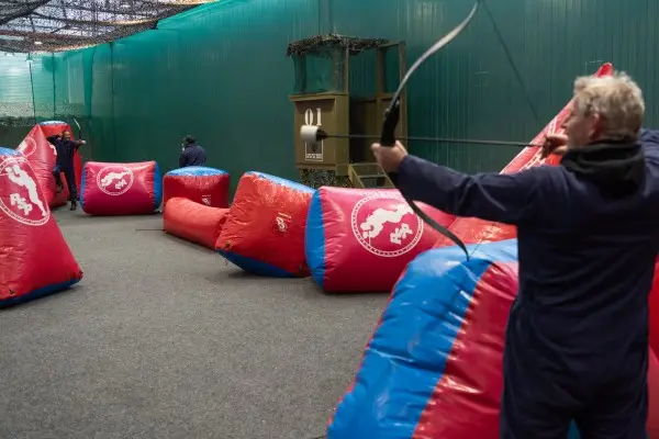 Archery tag game on the indoor field