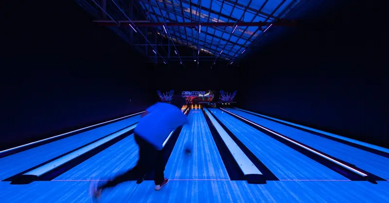 Bowler on a glowing lane