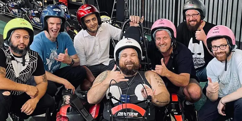 Group of drivers in helmets